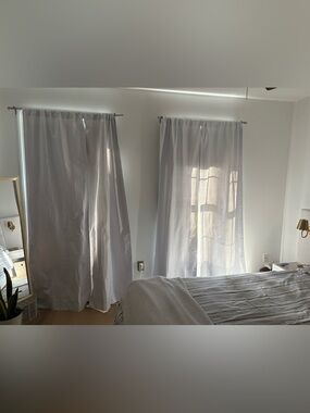 Four Mainstays White Blackout Curtains